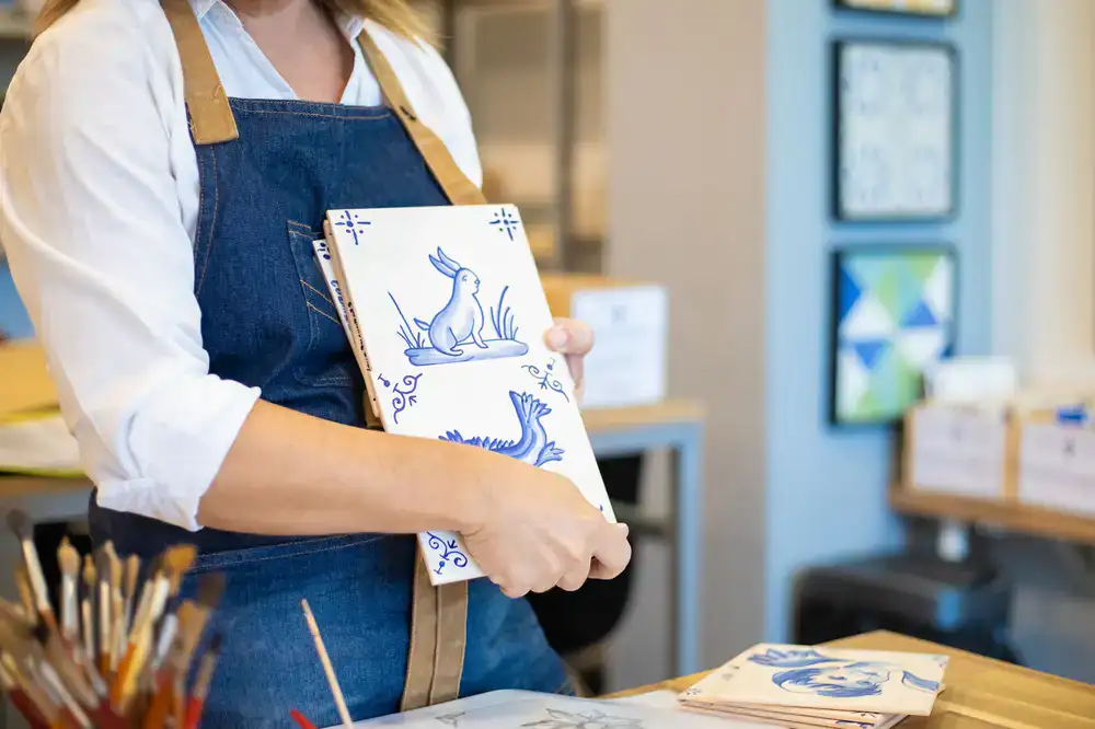 Hand-painted blue and white azulejo tiles in the studio